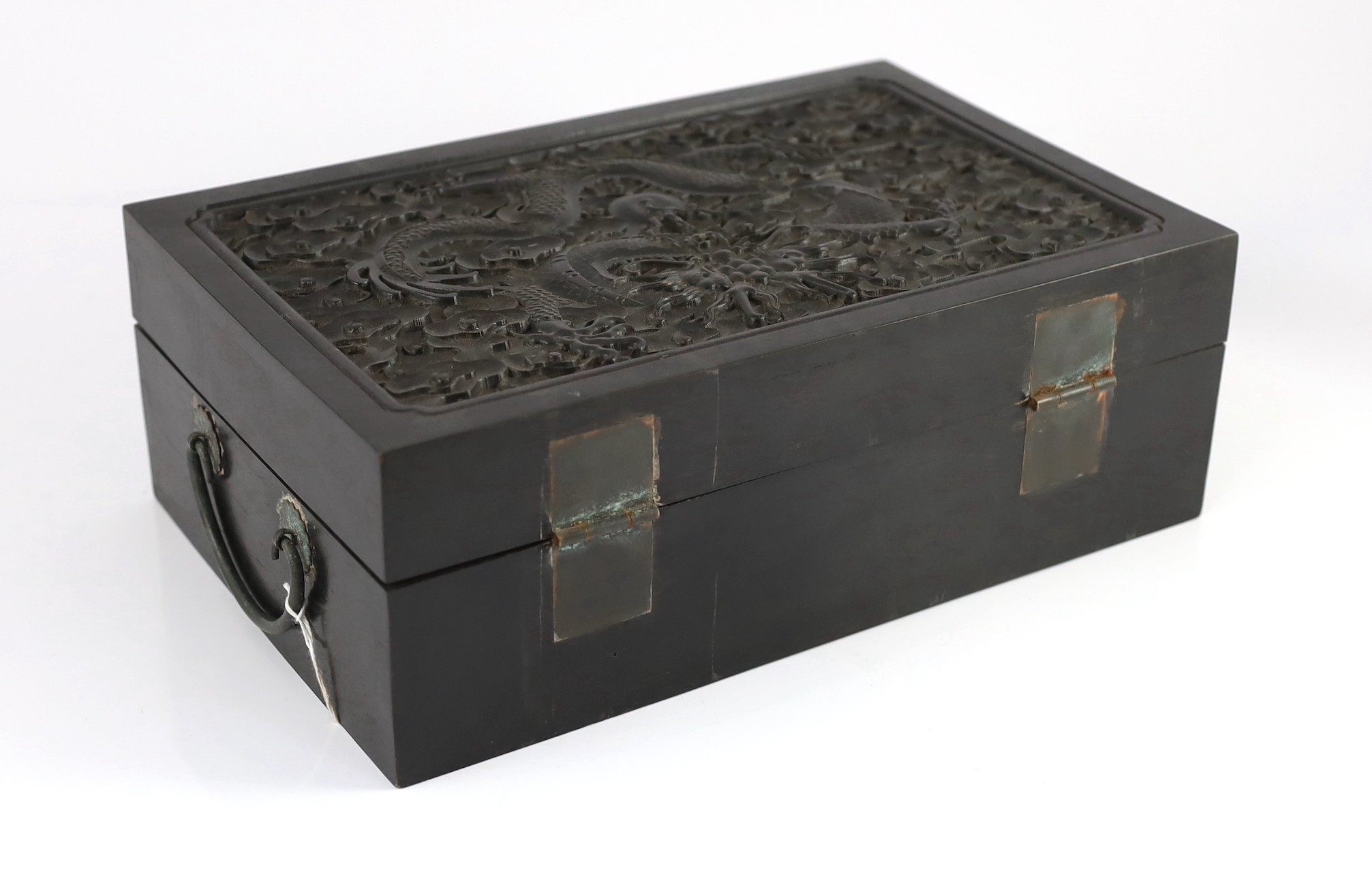 A Chinese hardwood 'dragon' box, possibly zitan, late 19th/early 20th century, 34cm wide